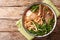 Easy Recipe forÂ Lanzhou Beef Noodle Soup closeup in a bowl. Horizontal top view